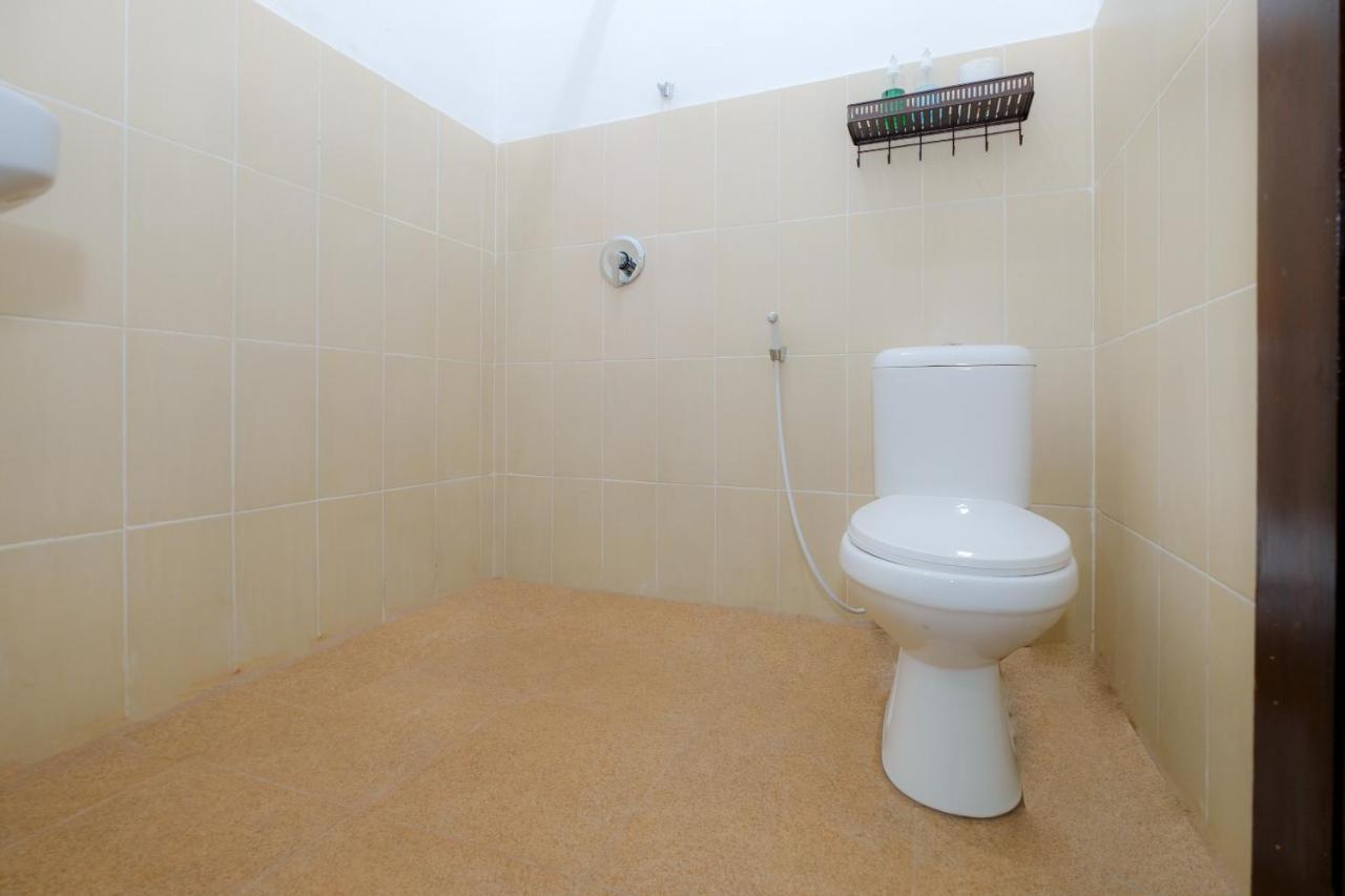 Oyo 2864 Mangsit Garden Homestay Bagian luar foto